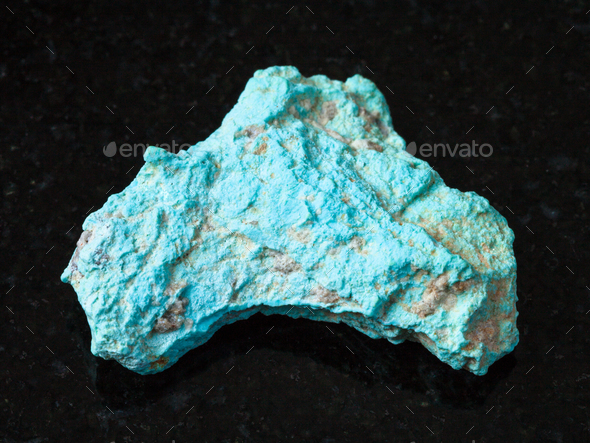 rough Turquoise stone on black - Stock Photo - Images
