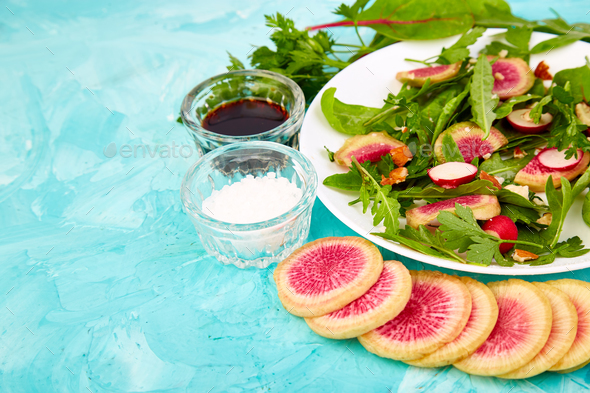 Salad in white plate around Ingredient - Stock Photo - Images