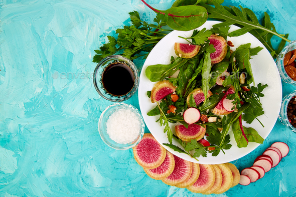 Salad in white plate around Ingredient - Stock Photo - Images