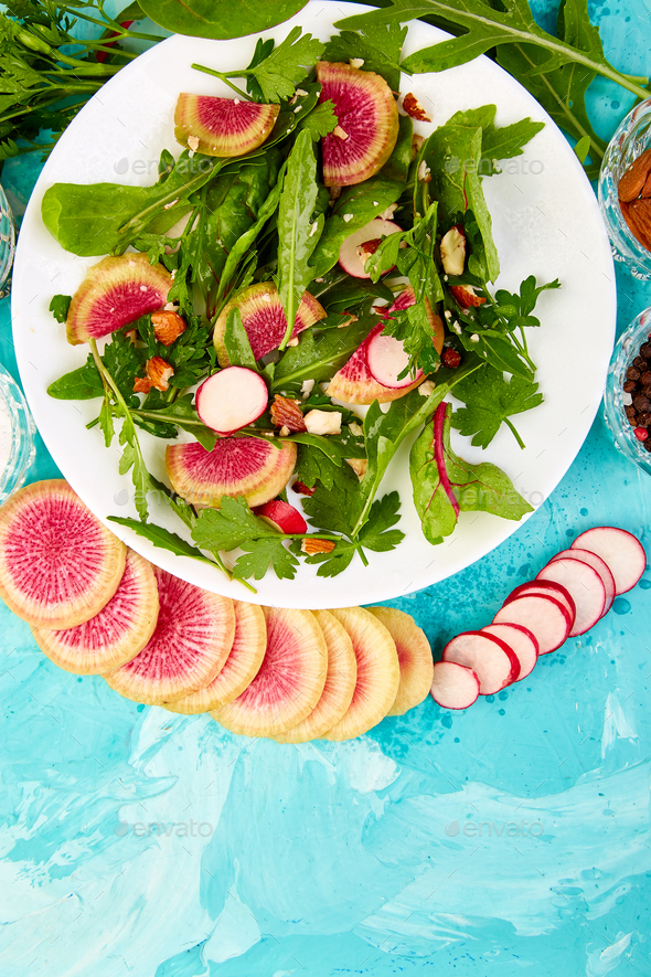 Salad in white plate around Ingredient - Stock Photo - Images