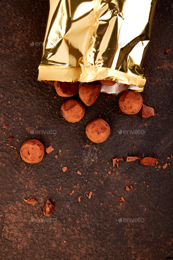 Chocolate Candy truffles fall out - Stock Photo - Images