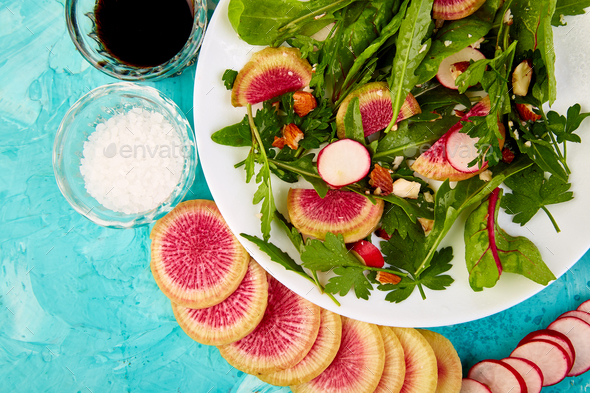 Salad in white plate around Ingredient - Stock Photo - Images