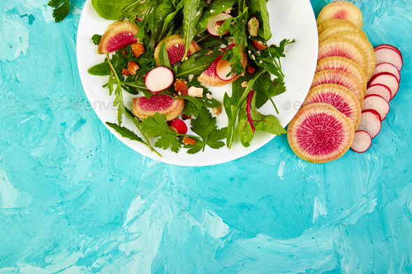 Salad in white plate around Ingredient - Stock Photo - Images