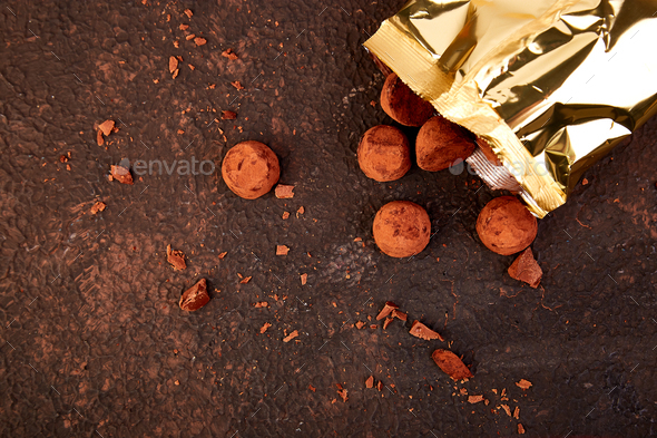Chocolate Candy truffles fall out - Stock Photo - Images