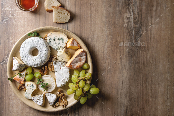 Cheese plate with honey - Stock Photo - Images