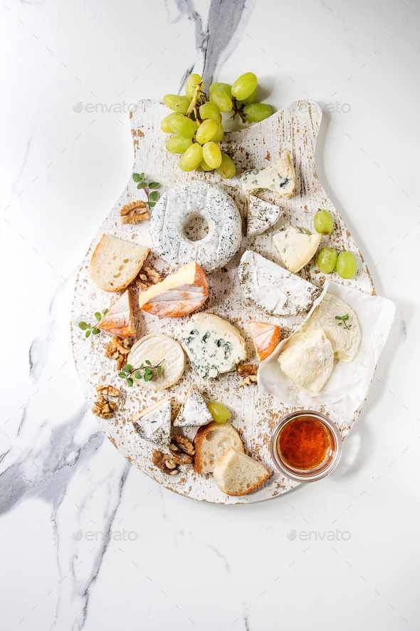 Cheese plate with honey - Stock Photo - Images