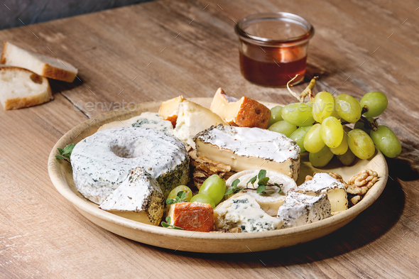 Cheese plate with honey - Stock Photo - Images
