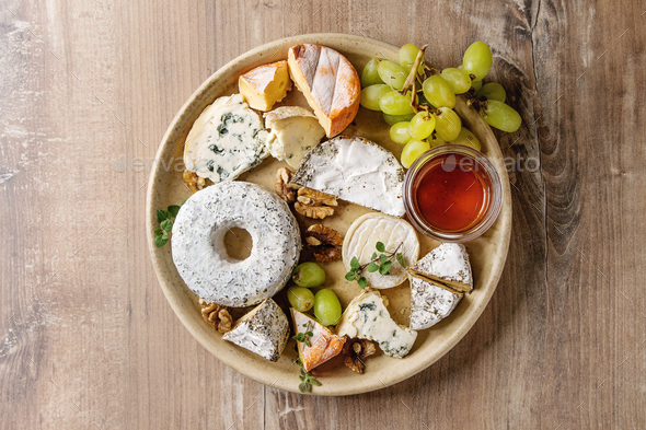 Cheese plate with honey - Stock Photo - Images