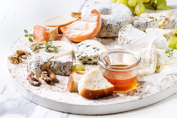 Cheese plate with honey - Stock Photo - Images