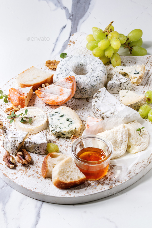 Cheese plate with honey - Stock Photo - Images