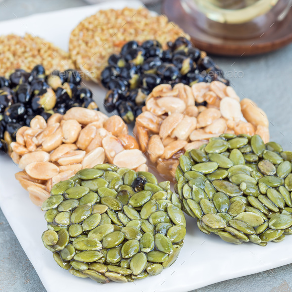 Korean traditional sweet snacks with peanuts, pumpkin seeds, bla - Stock Photo - Images