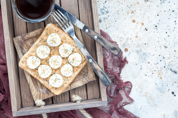 Healthy sandwich with crunchy peanut butter, banana and chia see - Stock Photo - Images