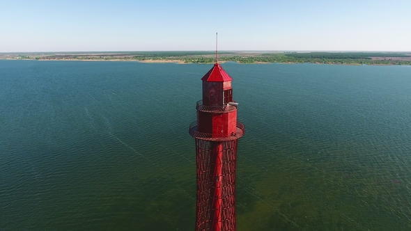 Aerial Shot of a Towering Lighthouse on the Black Sea Coast in Ukraine in Summer