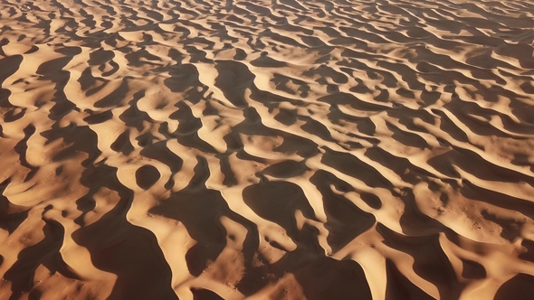 Aerial Top View on Sand Dunes in Sahara Desert alt