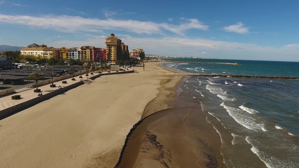 Beach, Sea, Shopping Center on a Sunny and Windy Day in Alboraya, Valencia.