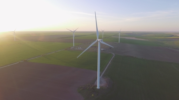 Wind Turbines and Agricultural Fields Producing Clean and Renewable Energy