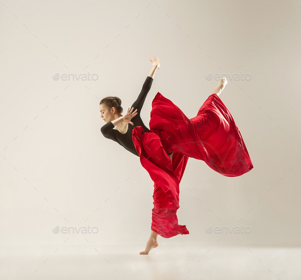 Modern ballet dancer dancing in full body on white studio background. - Stock Photo - Images