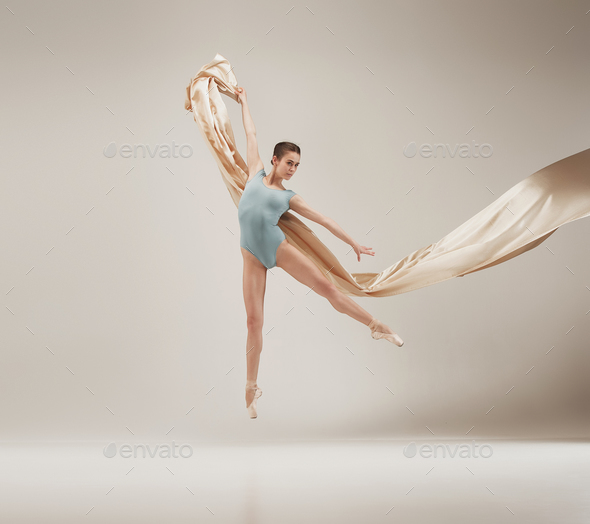 Modern ballet dancer dancing in full body on white studio background. - Stock Photo - Images