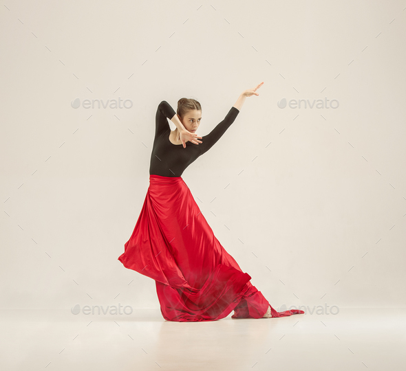 Modern ballet dancer dancing in full body on white studio background. - Stock Photo - Images
