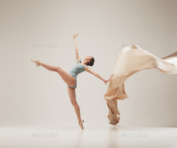 Modern ballet dancer dancing in full body on white studio background. - Stock Photo - Images