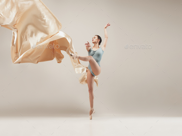 Modern ballet dancer dancing in full body on white studio background. - Stock Photo - Images