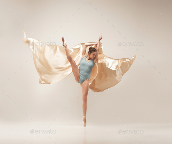Modern ballet dancer dancing in full on studio Stock Photo by master1305