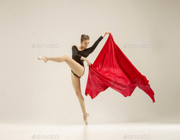 Modern ballet dancer dancing in full body on white studio background. - Stock Photo - Images