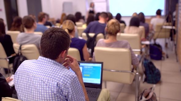 Business People Seminar Conference Meeting Office Training, Business. an in Blue Shirt Using Laptop