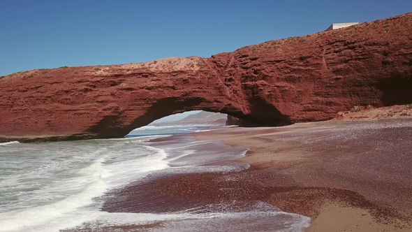 Flying Through Arch on Legzira Beach in Morocco alt