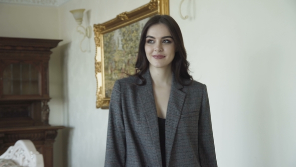 Seductive Cute Model Walks for Advertising Expensive Clothes. alt