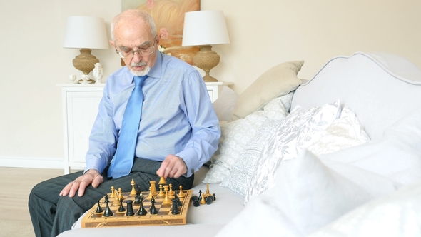 Elderly Grandmaster Man Plays Chess Alone, Old Man Playing Chess