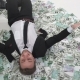 Happy Business Man Lying on a Pile of Money - VideoHive Item for Sale