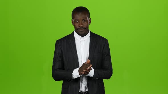 African American Claps His Hands and Shows His Fingers Up. Green Screen alt
