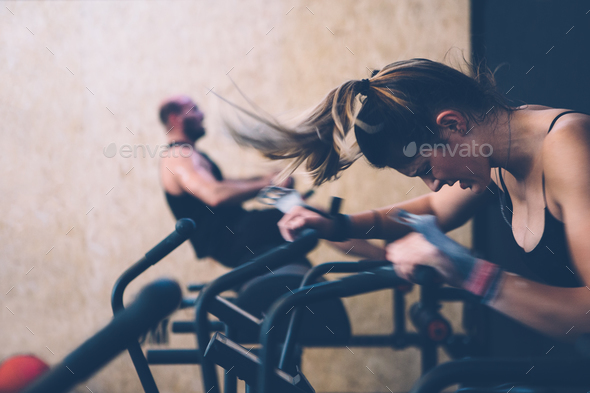 Young woman does calorie assault exercise Stock Photo by Click_and_Photo