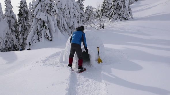 Snow Igloo Building in the High Mountain