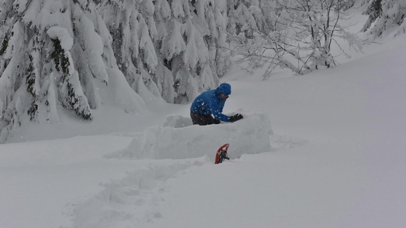 Snow Igloo Building in the High Mountain