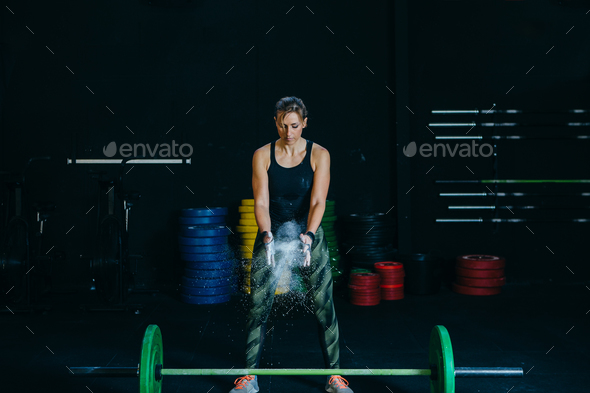 Magnesia powder and barbell. - Stock Photo - Images
