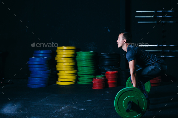 Man ready for a barbell snatch - Stock Photo - Images