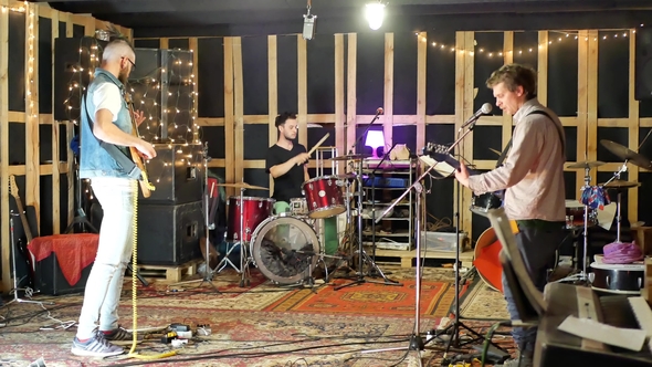 Music Band Performing at Recording Studio