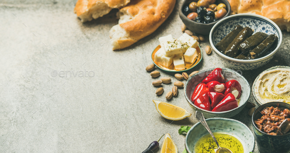 Mediterranean or Middle Eastern meze starter fingerfood assortment, wide composition - Stock Photo - Images