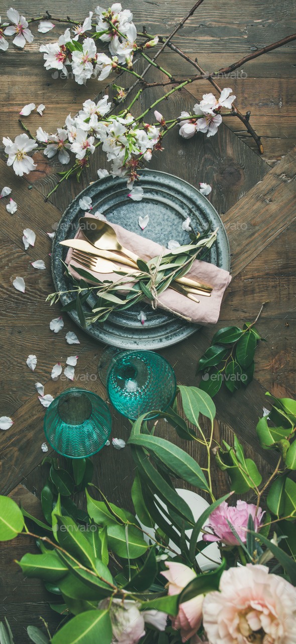 Flat-lay of Table setting with spring flowers, vertical composition - Stock Photo - Images