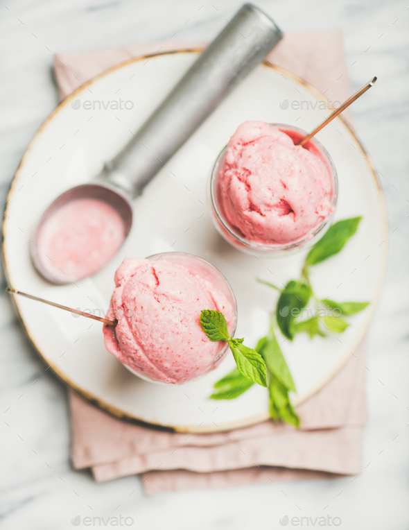 Homemade strawberry yogurt ice cream with fresh mint, top view - Stock Photo - Images