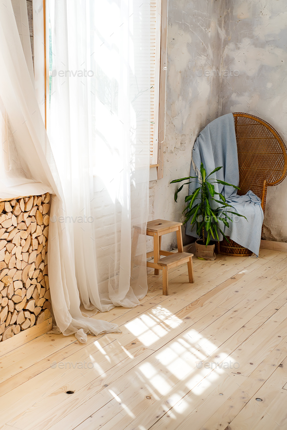 Glass windows with white curtains, flower in a pot on the floor and view over the trees. - Stock Photo - Images