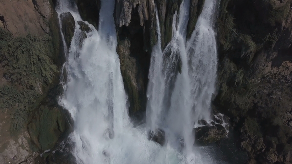Aerial Footage of the Waterfall and Blue Sea alt