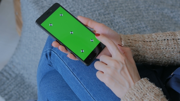 Woman Using Smart Phone Phone with Green Screen