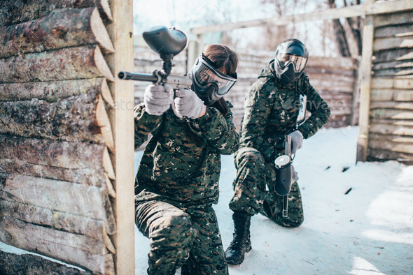 Paintball team, players in winter battle - Stock Photo - Images