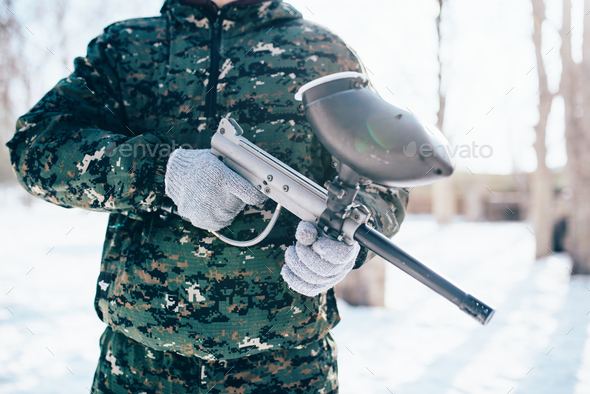 Male paintball player, military game equipment - Stock Photo - Images