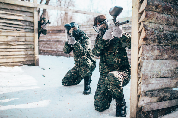 Paintball team, players in winter battle - Stock Photo - Images