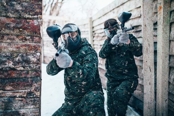Paintball team, players in winter battle - Stock Photo - Images