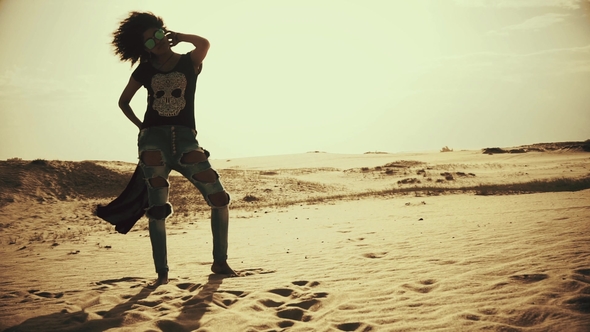 Woman in the Windy Desert